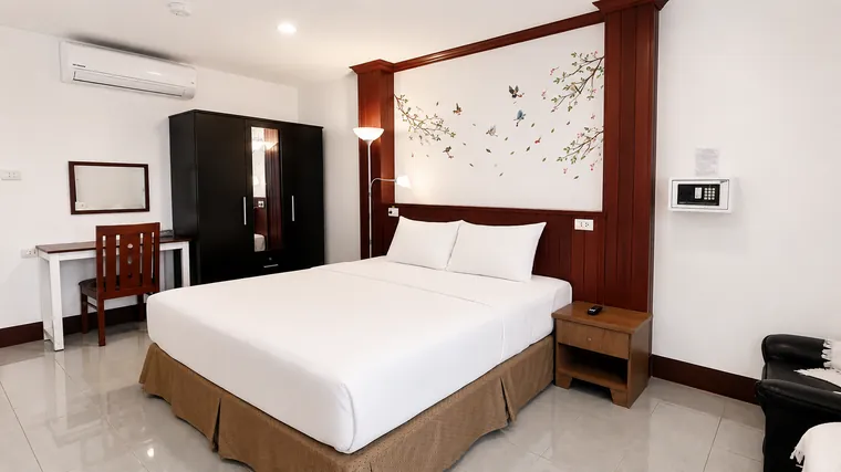 Spacious hotel-style room with a double bed